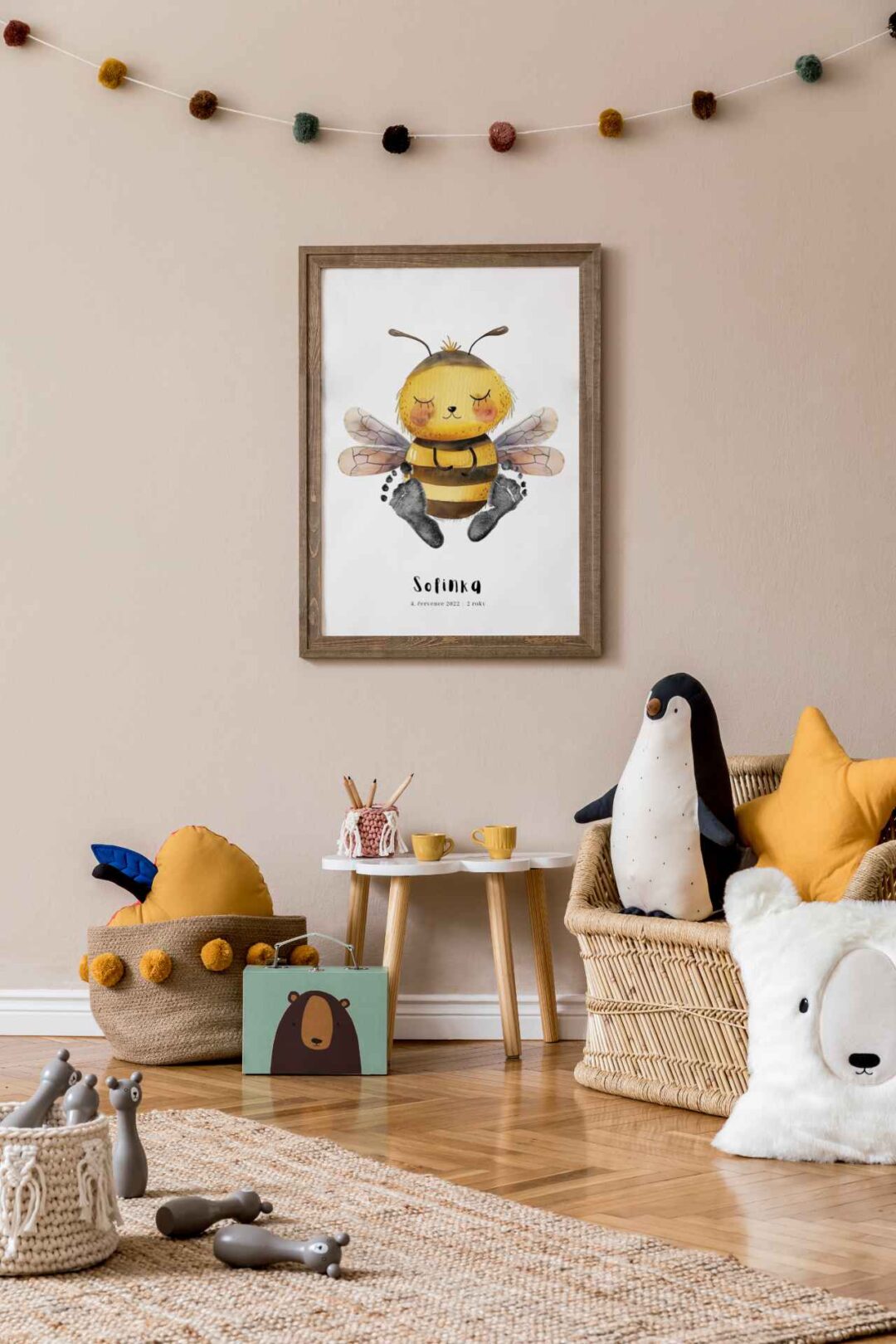 Stylish and beige scandinavian decor of kid room with mock up poster frame, design furnitures, natural toys, hanging cotton balls, plush animal, child accessories and teddy bears. Neutral home decor.